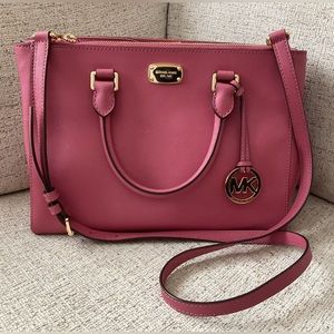 Michael kors medium size satchel bag.